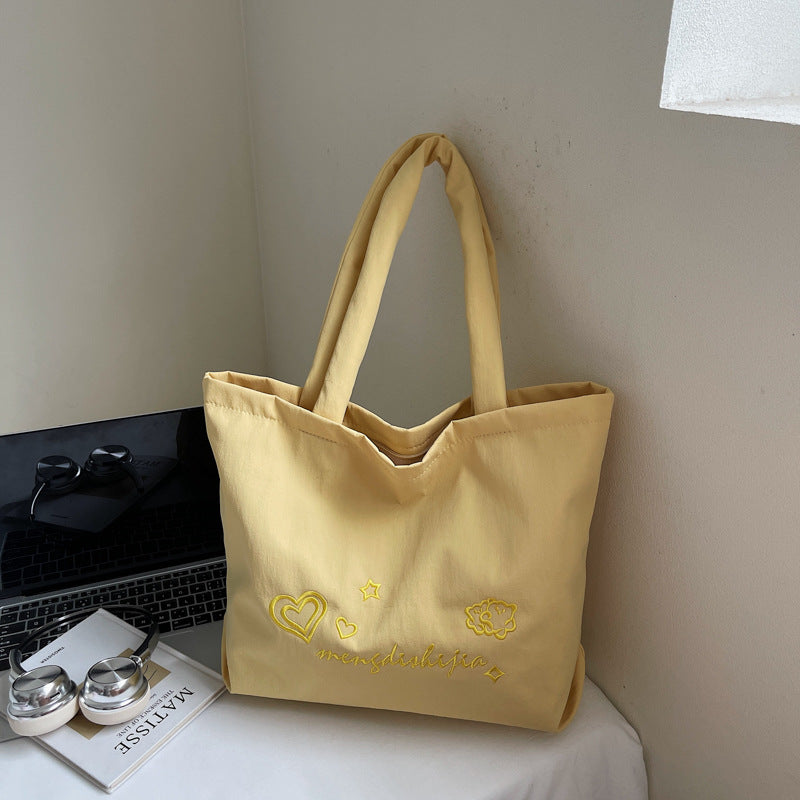 Large capacity bag for women's autumn and winter versatile 2025 new simple canvas shoulder shopping bag, student class tote bag