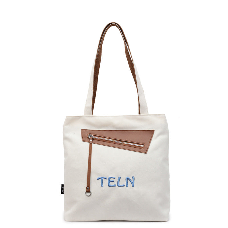 Korean casual college style canvas bag, women's seasonal new fashion tote bag, casual large capacity shoulder bag