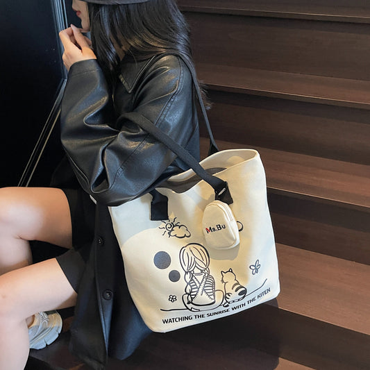 Korean printed canvas bag, women's versatile casual handbag, 2025 new model, is a brush order large capacity shoulder bag
