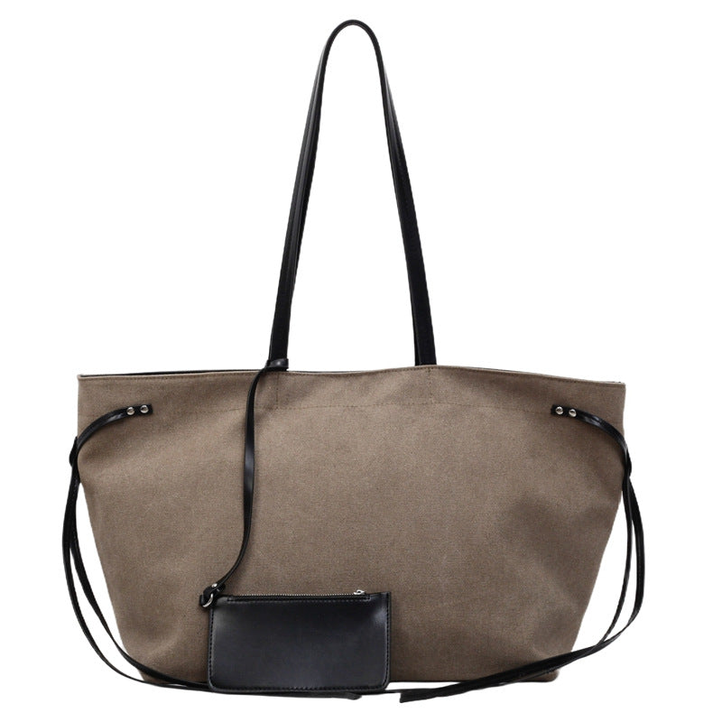 Small and high-end canvas splicing large capacity portable tote bag for women 2025 new shoulder bag fashion underarm bag