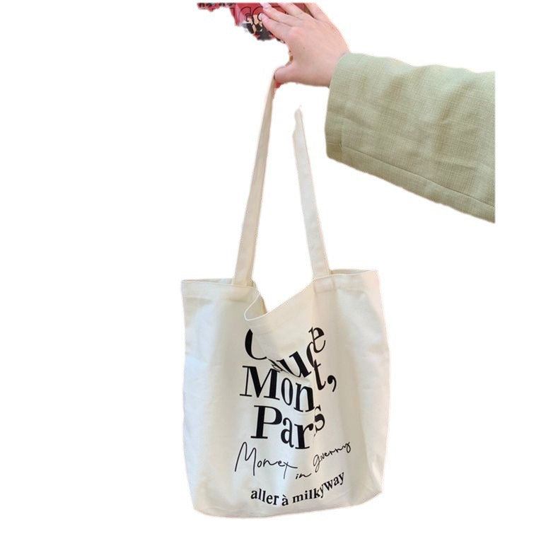 2025 new minimalist letter canvas bag, casual and versatile commuting shoulder bag, female student tote bag