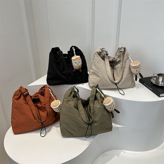 Large capacity drawstring bucket bag for women 2024 new Japanese ins casual crossbody bag street shoulder commuting bag