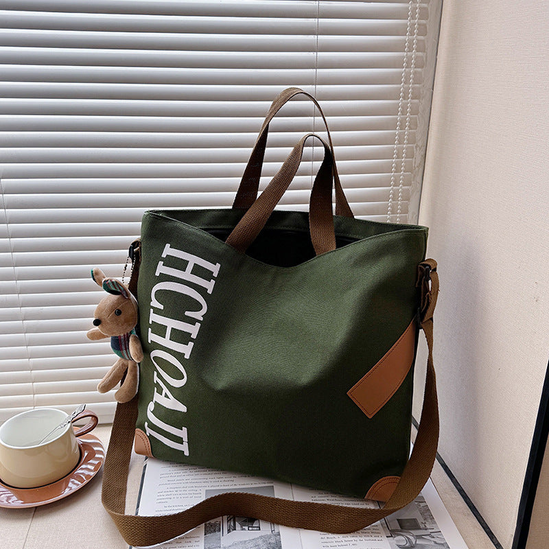 Outdoor canvas bag, women's high-end sense, large capacity tote bag, student class niche ins crossbody shoulder bag