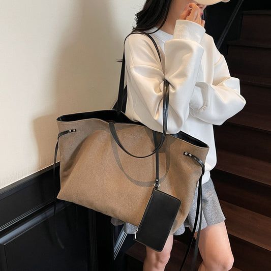 Small and high-end canvas splicing large capacity portable tote bag for women 2025 new shoulder bag fashion underarm bag