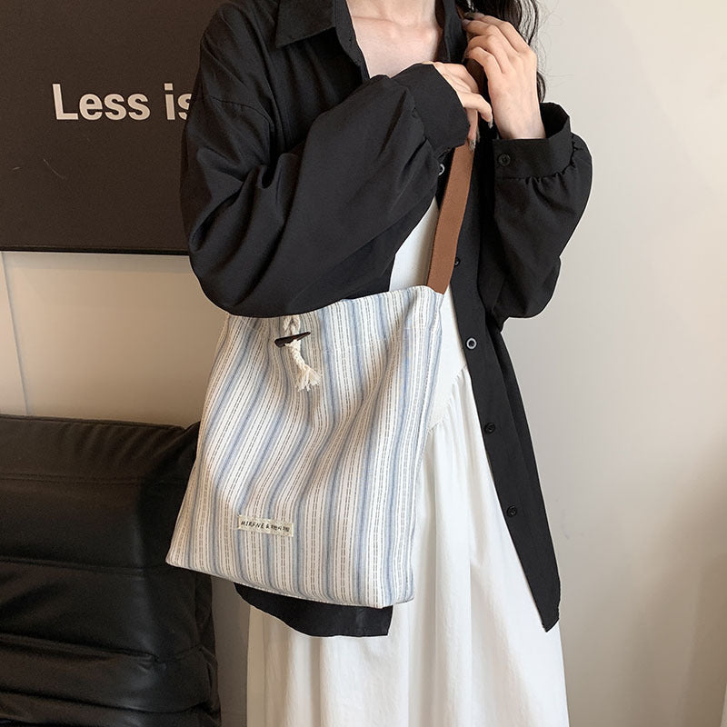 Large capacity canvas bag for women 2025 new summer fashion casual armpit bag commuting shoulder tote bag