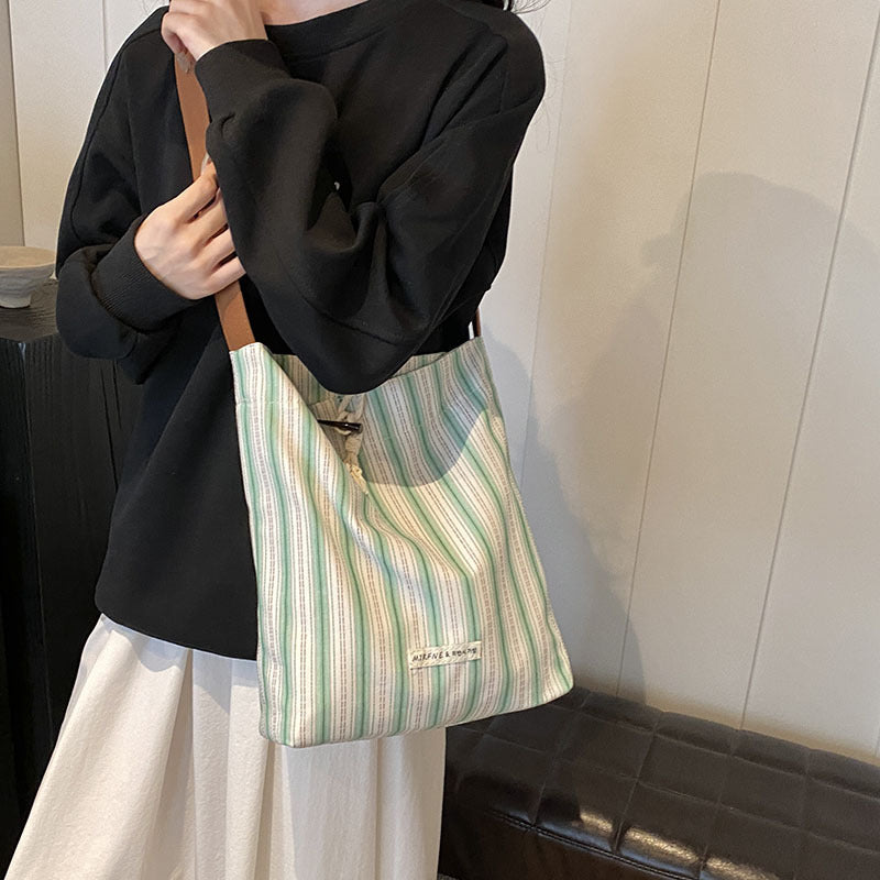 Large capacity canvas bag for women 2025 new summer fashion casual armpit bag commuting shoulder tote bag