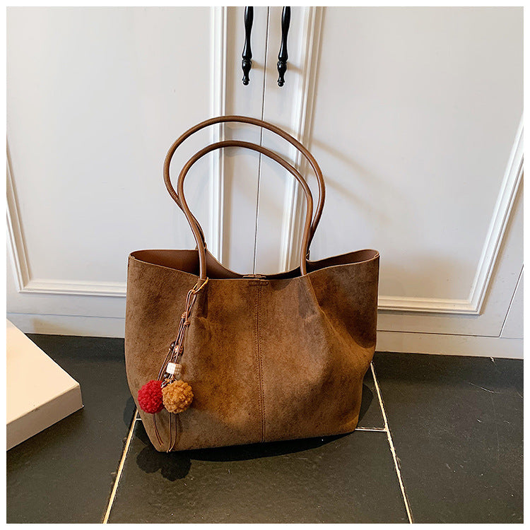 Autumn and winter new suede commuting large capacity tote bag 2025 women's casual simple and versatile ins shoulder bag
