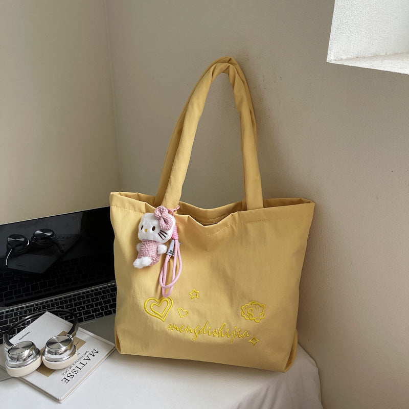 Large capacity bag for women's autumn and winter versatile 2025 new simple canvas shoulder shopping bag, student class tote bag