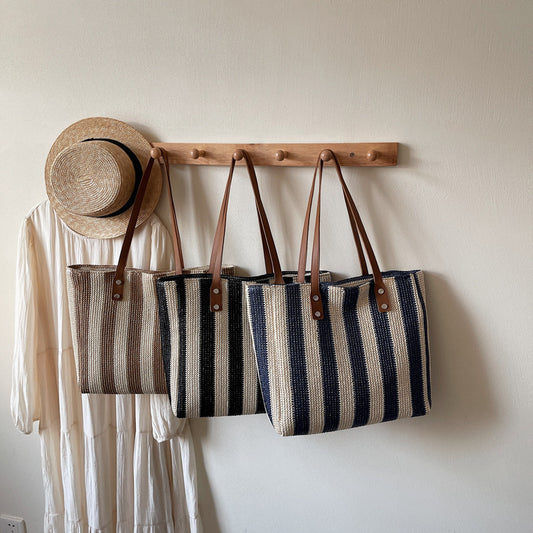 Large capacity fashionable hand-held woven bag for women's cross-border new Korean version striped shoulder bag for vacation and leisure beach bag