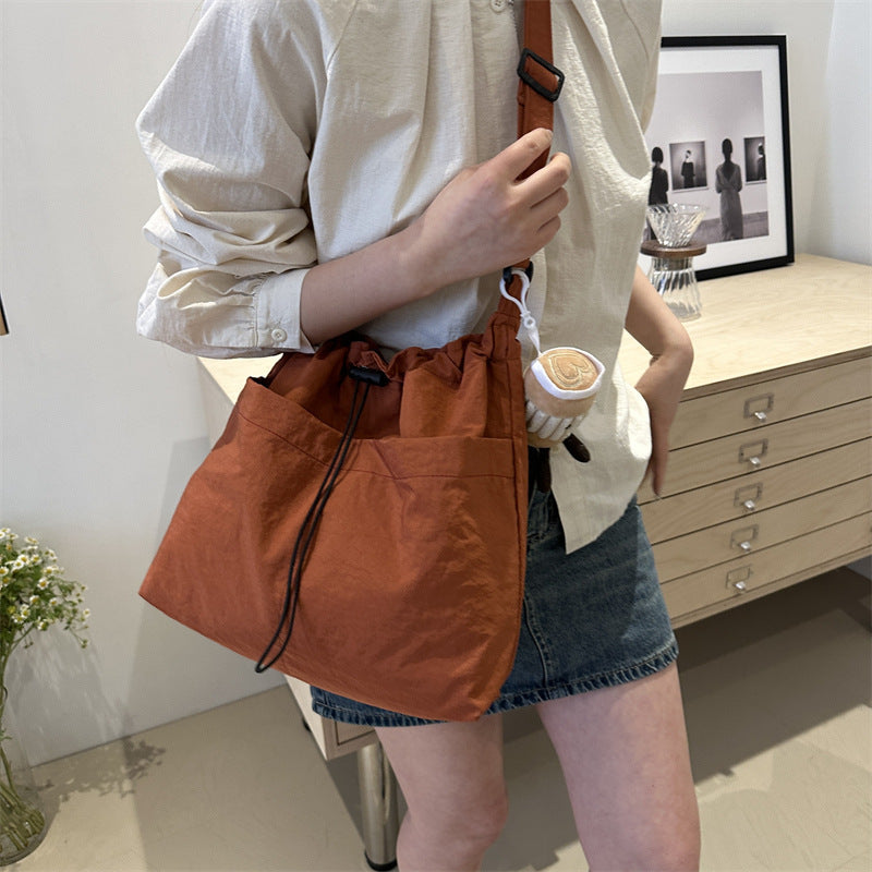 Large capacity drawstring bucket bag for women 2024 new Japanese ins casual crossbody bag street shoulder commuting bag