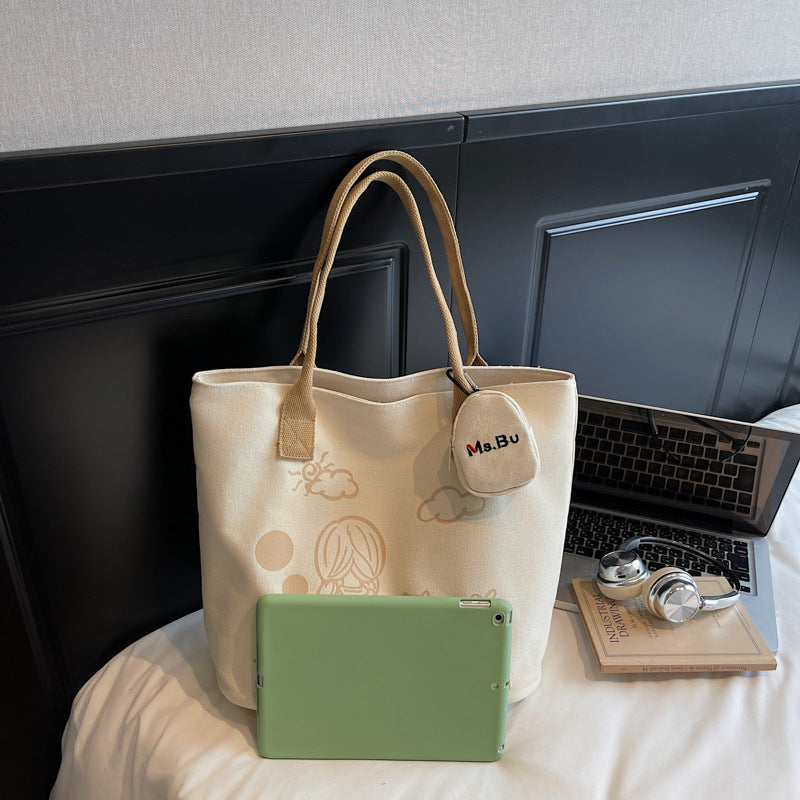 Korean printed canvas bag, women's versatile casual handbag, 2025 new model, is a brush order large capacity shoulder bag