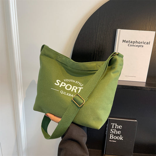 2025 new solid color letter printed canvas trendy and personalized daily simple women's bag shoulder bag crossbody bag vertical women's bag