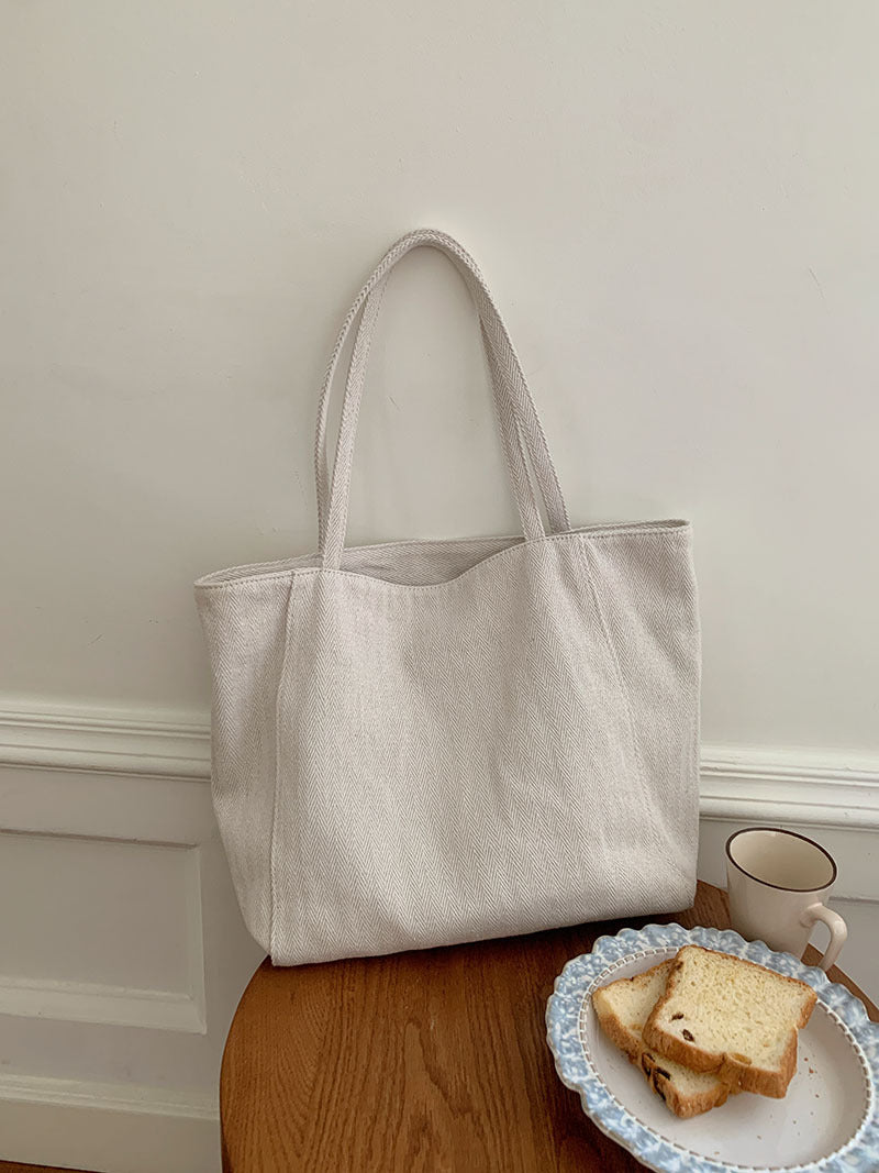 Women's 2025 new large capacity tote bag, Korean version twill canvas bag, commuting single shoulder hand-held casual women's bag