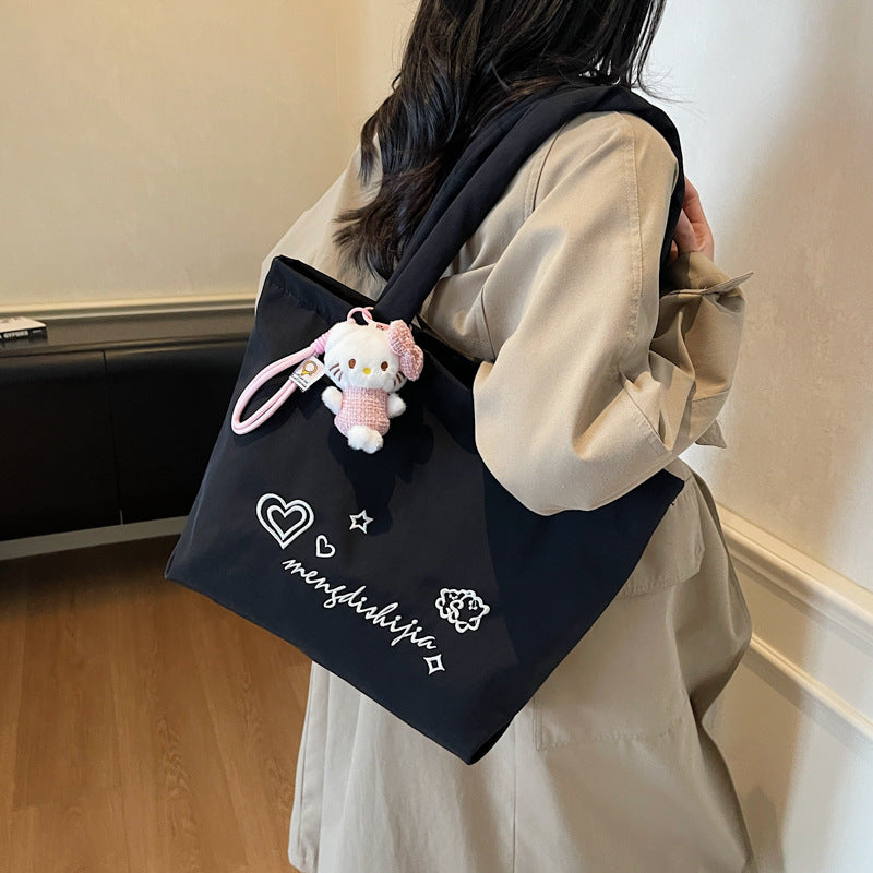 Large capacity bag for women's autumn and winter versatile 2025 new simple canvas shoulder shopping bag, student class tote bag