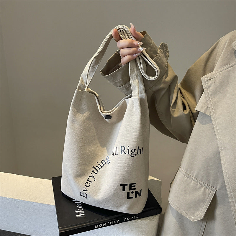2025 new letter printed canvas bag, women's minimalist artistic underarm bag, new large capacity versatile shoulder bag