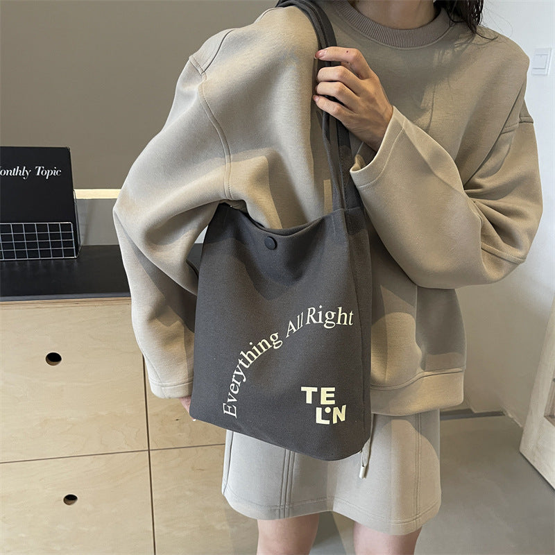 2025 new letter printed canvas bag, women's minimalist artistic underarm bag, new large capacity versatile shoulder bag