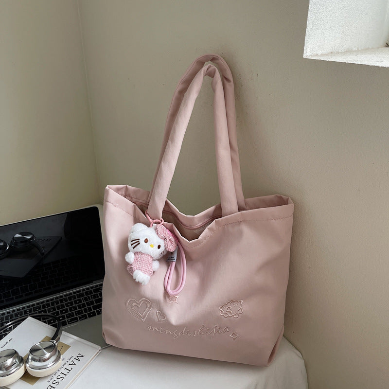 Large capacity bag for women's autumn and winter versatile 2025 new simple canvas shoulder shopping bag, student class tote bag