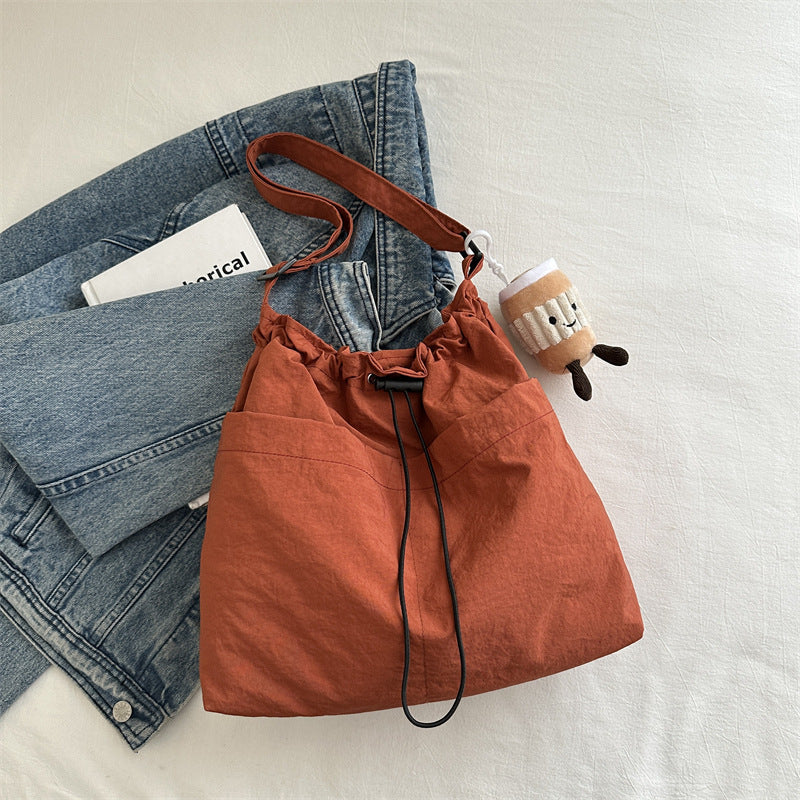 Large capacity drawstring bucket bag for women 2024 new Japanese ins casual crossbody bag street shoulder commuting bag