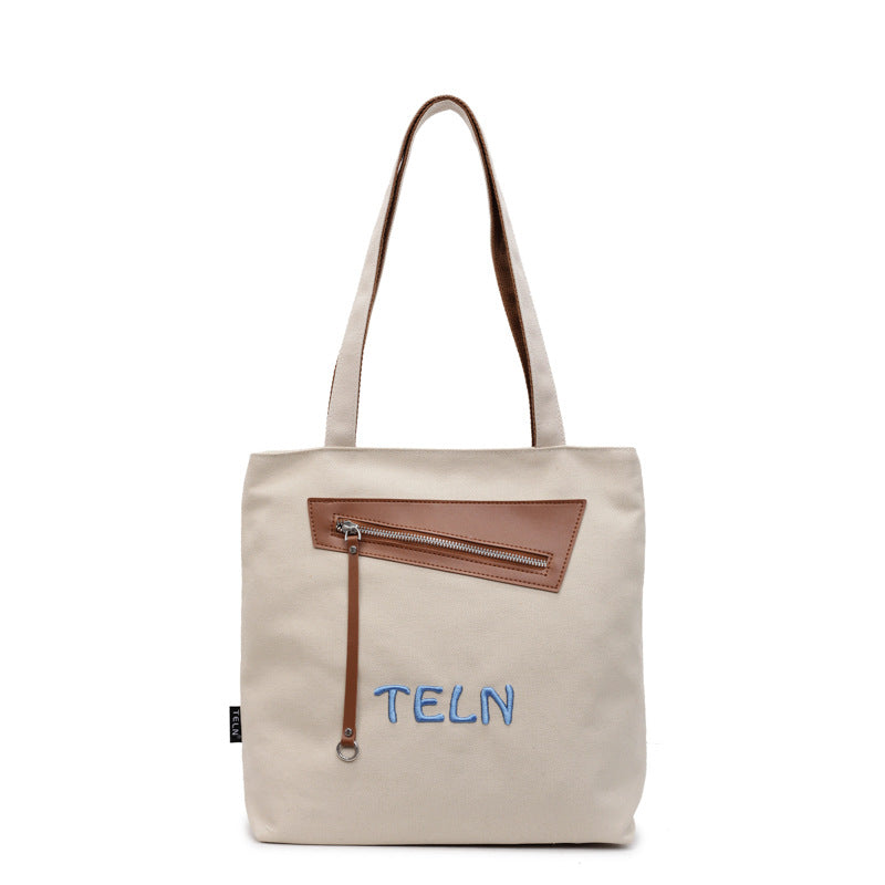 Korean casual college style canvas bag, women's seasonal new fashion tote bag, casual large capacity shoulder bag