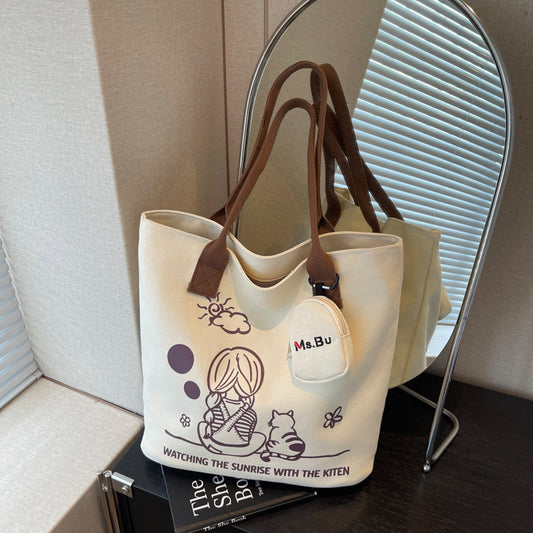 Korean printed canvas bag, women's versatile casual handbag, 2025 new model, is a brush order large capacity shoulder bag