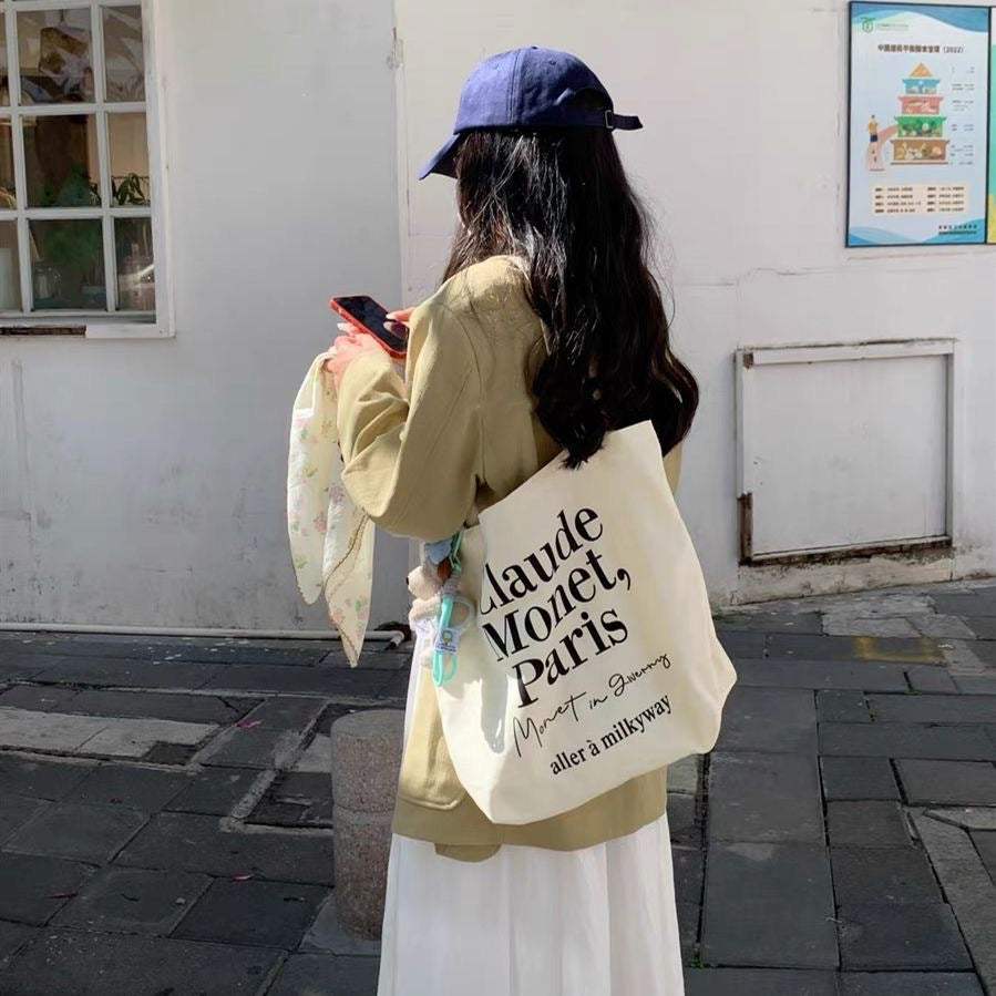 2025 new minimalist letter canvas bag, casual and versatile commuting shoulder bag, female student tote bag