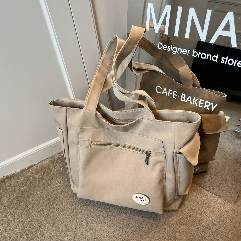 Single shoulder bag, women's large capacity versatile canvas bag, student simple handbag, casual crossbody bag, tutoring bag, mommy bag