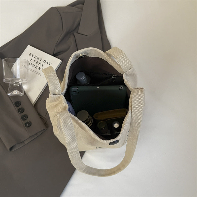 2025 new letter printed canvas bag, women's minimalist artistic underarm bag, new large capacity versatile shoulder bag