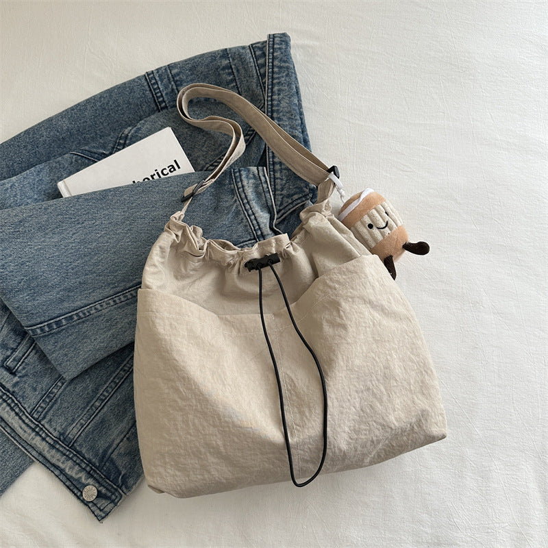 Large capacity drawstring bucket bag for women 2024 new Japanese ins casual crossbody bag street shoulder commuting bag