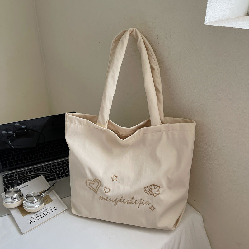 Large capacity bag for women's autumn and winter versatile 2025 new simple canvas shoulder shopping bag, student class tote bag