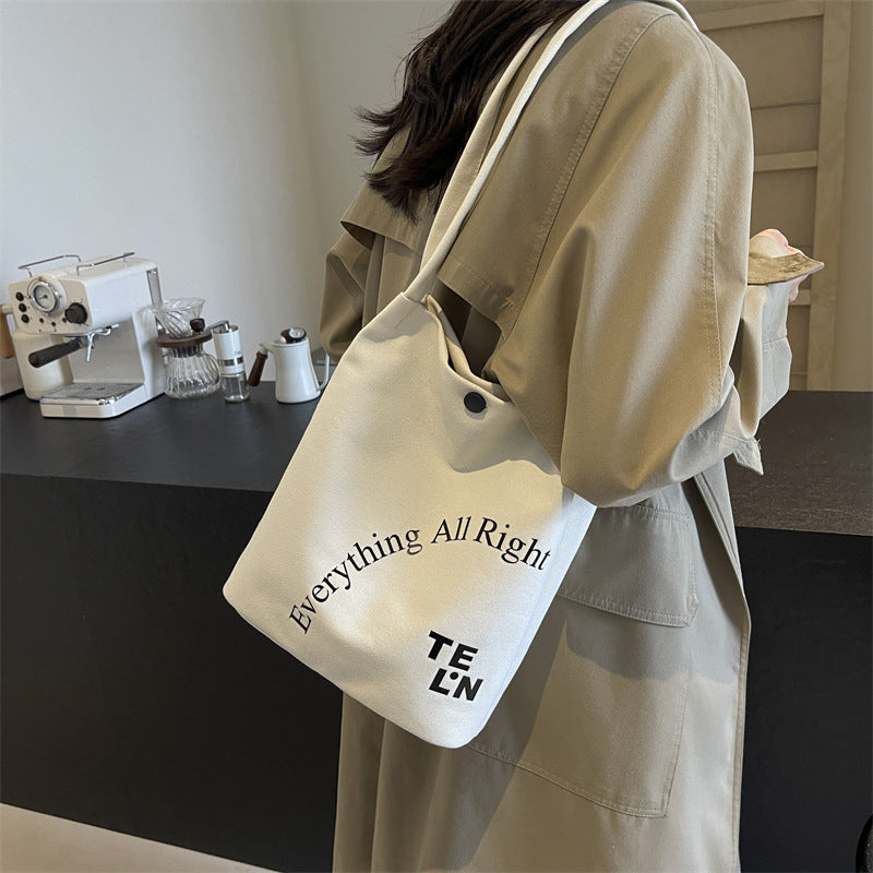 2025 new letter printed canvas bag, women's minimalist artistic underarm bag, new large capacity versatile shoulder bag
