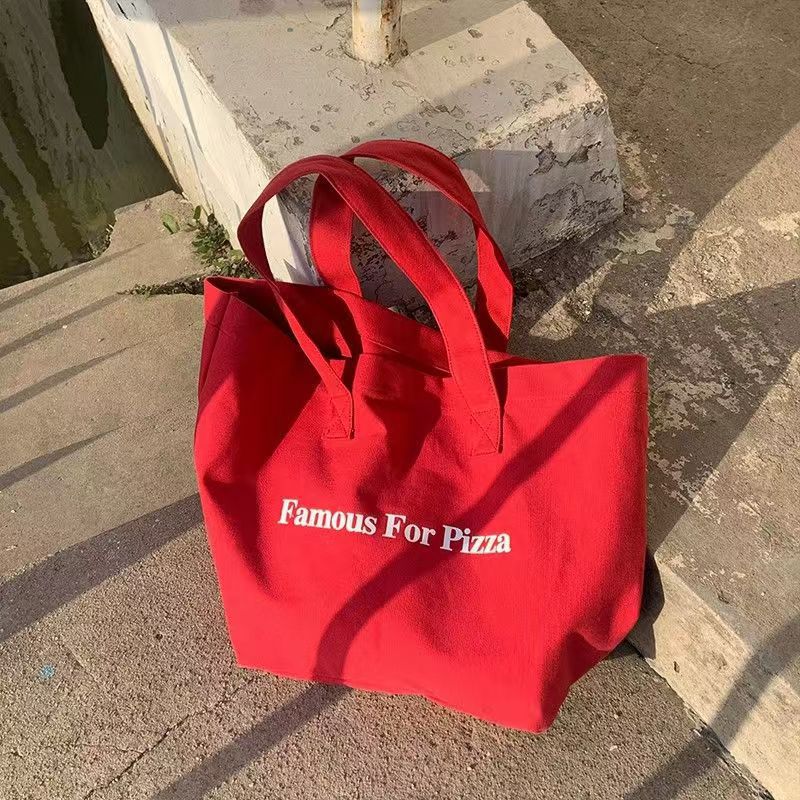 Small niche red canvas bag 2025 new casual letter printed canvas shoulder bag large capacity student tote bag