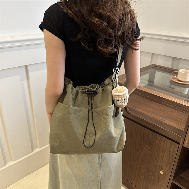 Large capacity drawstring bucket bag for women 2024 new Japanese ins casual crossbody bag street shoulder commuting bag