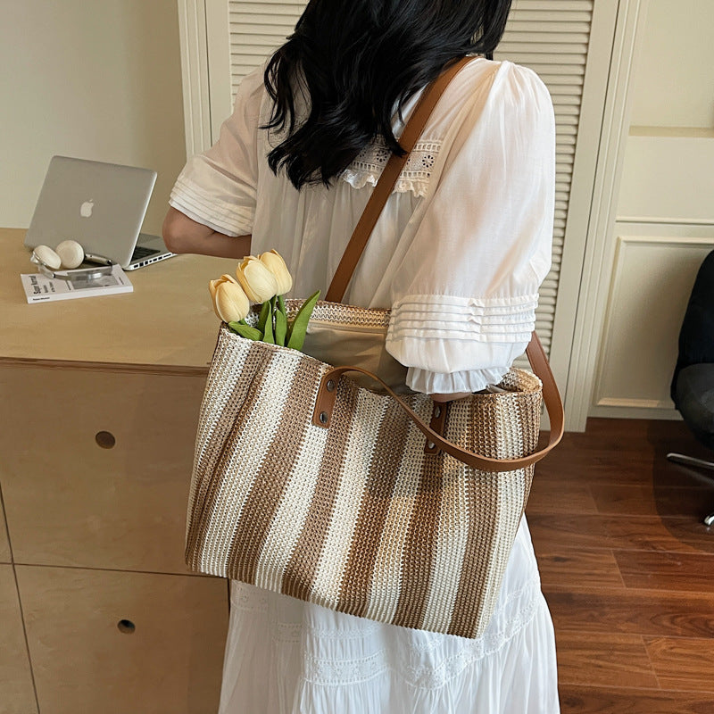 Large capacity fashionable hand-held woven bag for women's cross-border new Korean version striped shoulder bag for vacation and leisure beach bag