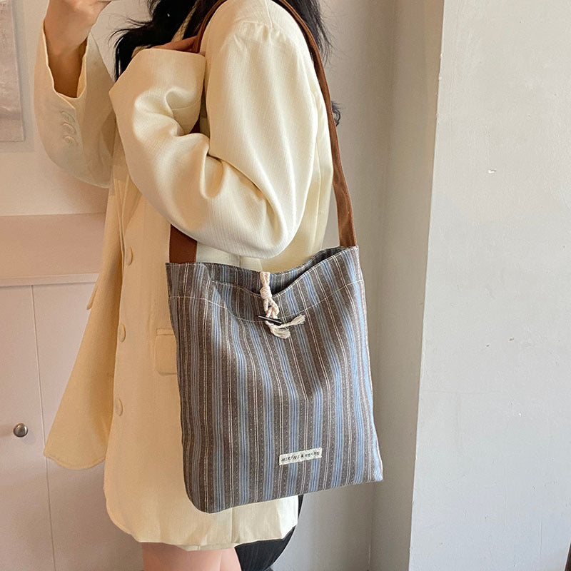 Large capacity canvas bag for women 2025 new summer fashion casual armpit bag commuting shoulder tote bag