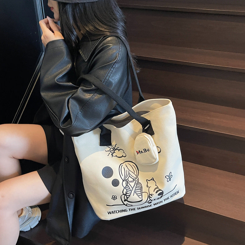 Korean printed canvas bag, women's versatile casual handbag, 2025 new model, is a brush order large capacity shoulder bag