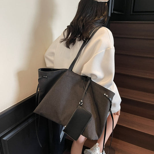 Small and high-end canvas splicing large capacity portable tote bag for women 2025 new shoulder bag fashion underarm bag