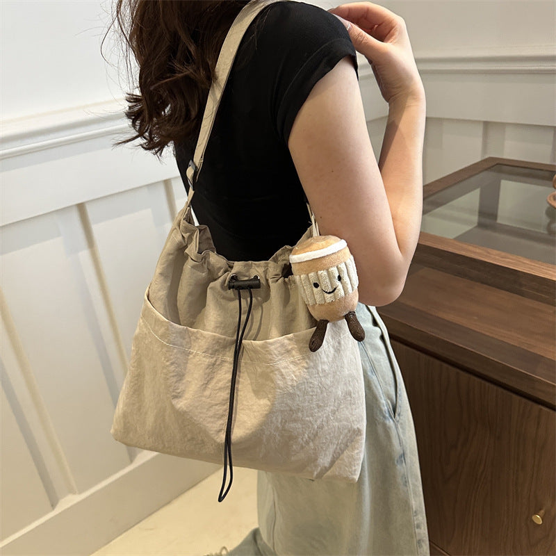 Large capacity drawstring bucket bag for women 2024 new Japanese ins casual crossbody bag street shoulder commuting bag