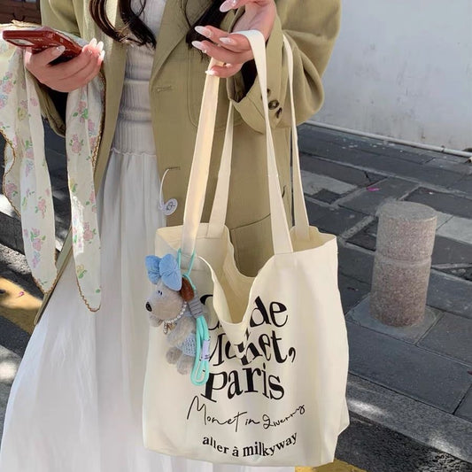 2025 new minimalist letter canvas bag, casual and versatile commuting shoulder bag, female student tote bag