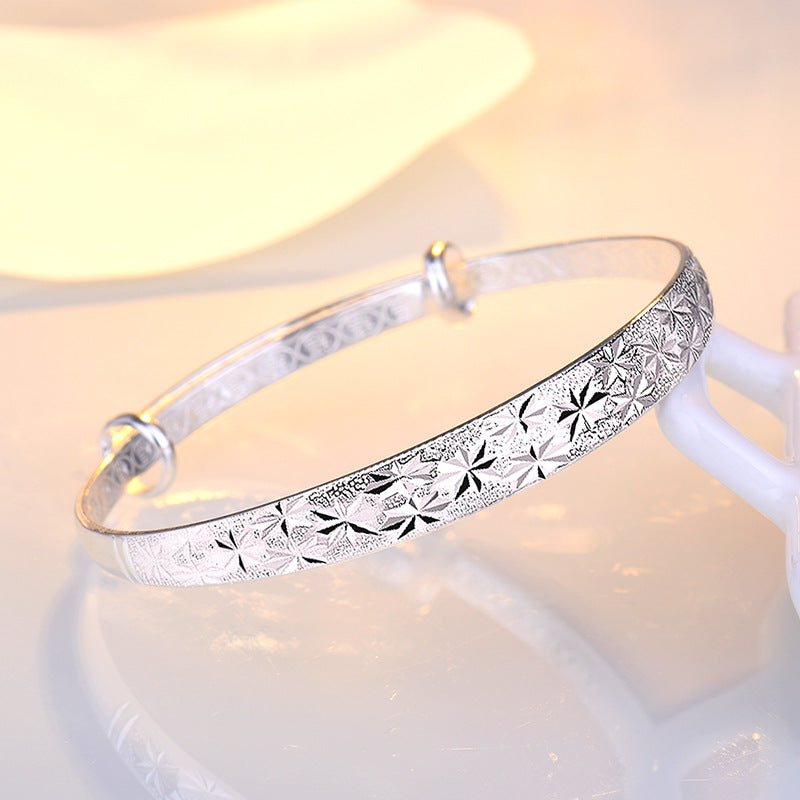 Graceful Star-Engraved Silver Bangle for Women