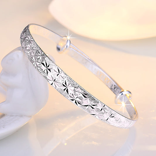 Graceful Star-Engraved Silver Bangle for Women