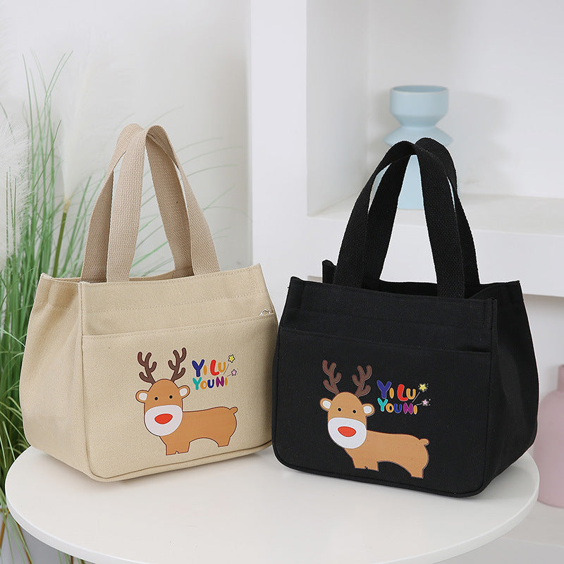 2025 New Cartoon Printed Handbag Large Capacity Simple Fashion Tote Bag Multi functional Makeup Bag