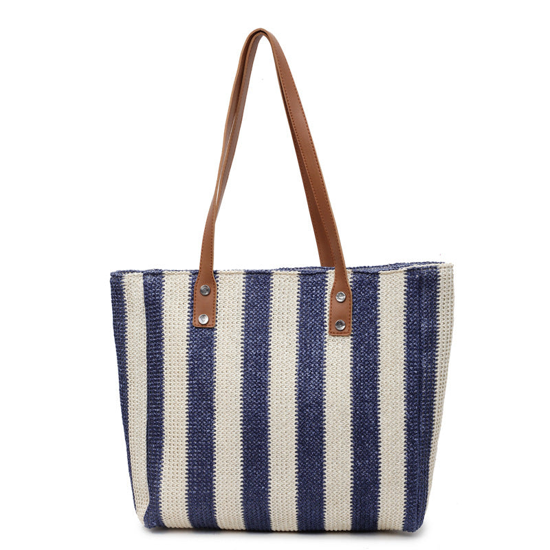 Large capacity fashionable hand-held woven bag for women's cross-border new Korean version striped shoulder bag for vacation and leisure beach bag