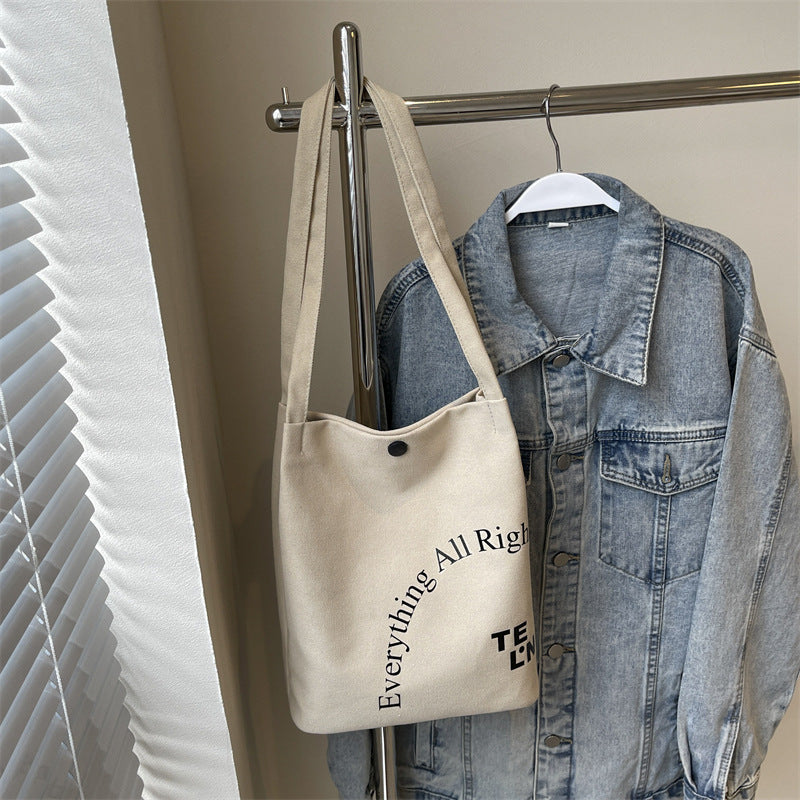 2025 new letter printed canvas bag, women's minimalist artistic underarm bag, new large capacity versatile shoulder bag