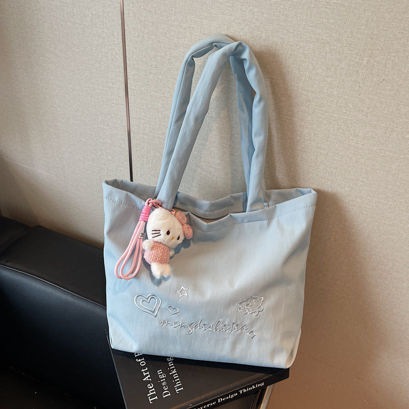 Large capacity bag for women's autumn and winter versatile 2025 new simple canvas shoulder shopping bag, student class tote bag