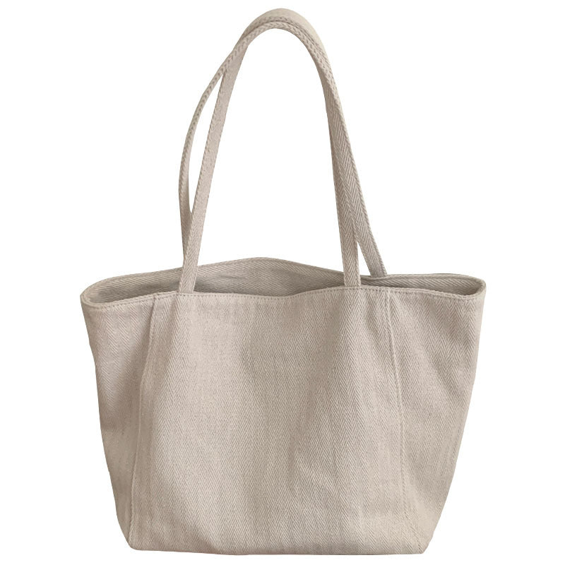 Women's 2025 new large capacity tote bag, Korean version twill canvas bag, commuting single shoulder hand-held casual women's bag