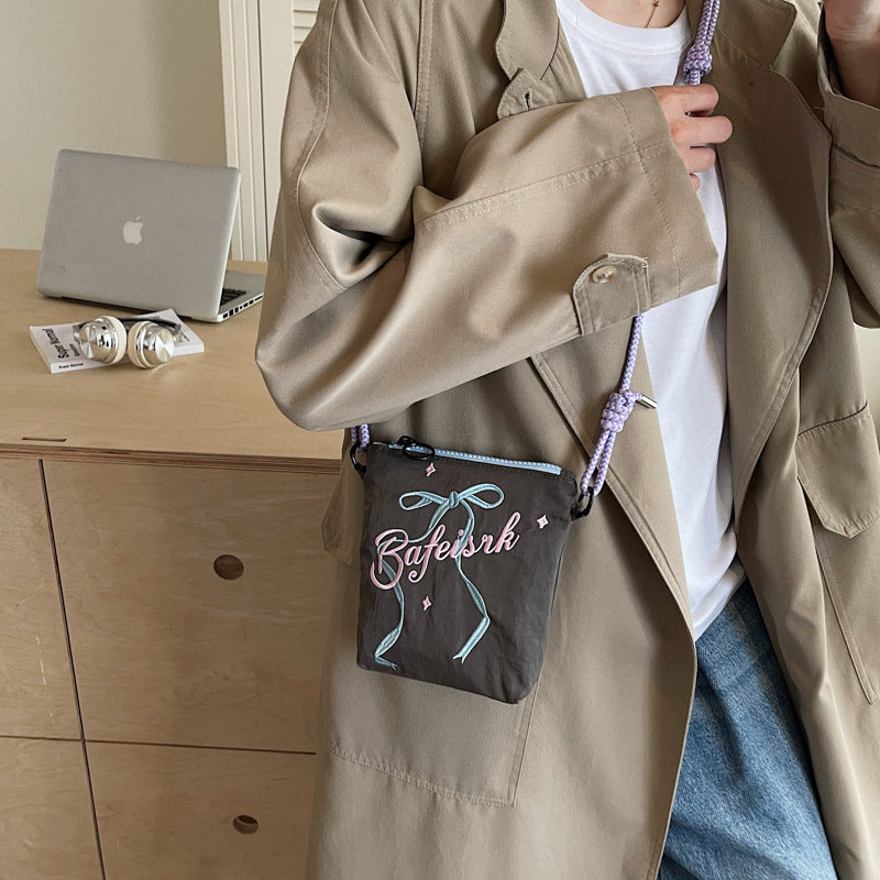 Niche design letter printed shoulder bag ballet style bow embroidered crossbody bag daily commuting small shoulder bag