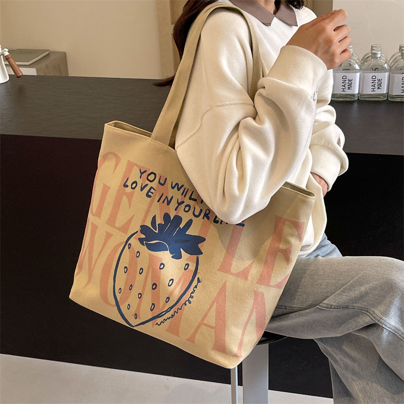 Letter canvas bag 2025 new strawberry print Gentle Woman shoulder bag commuting tote bag