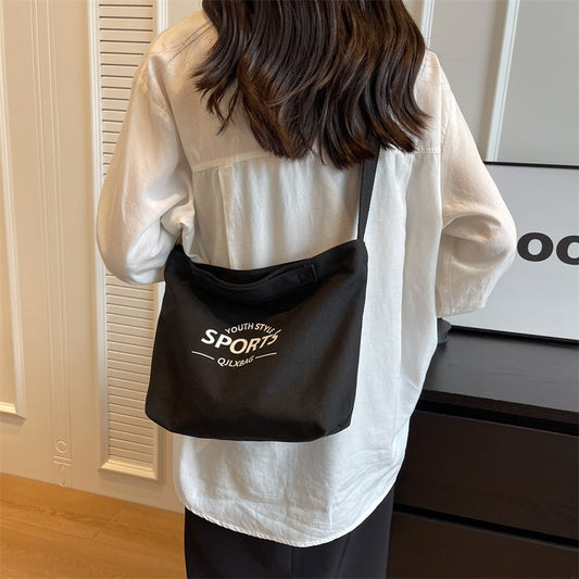 2025 new solid color letter printed canvas trendy and personalized daily simple women's bag shoulder bag crossbody bag vertical women's bag
