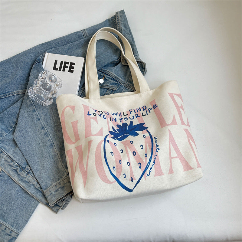Letter canvas bag 2025 new strawberry print Gentle Woman shoulder bag commuting tote bag