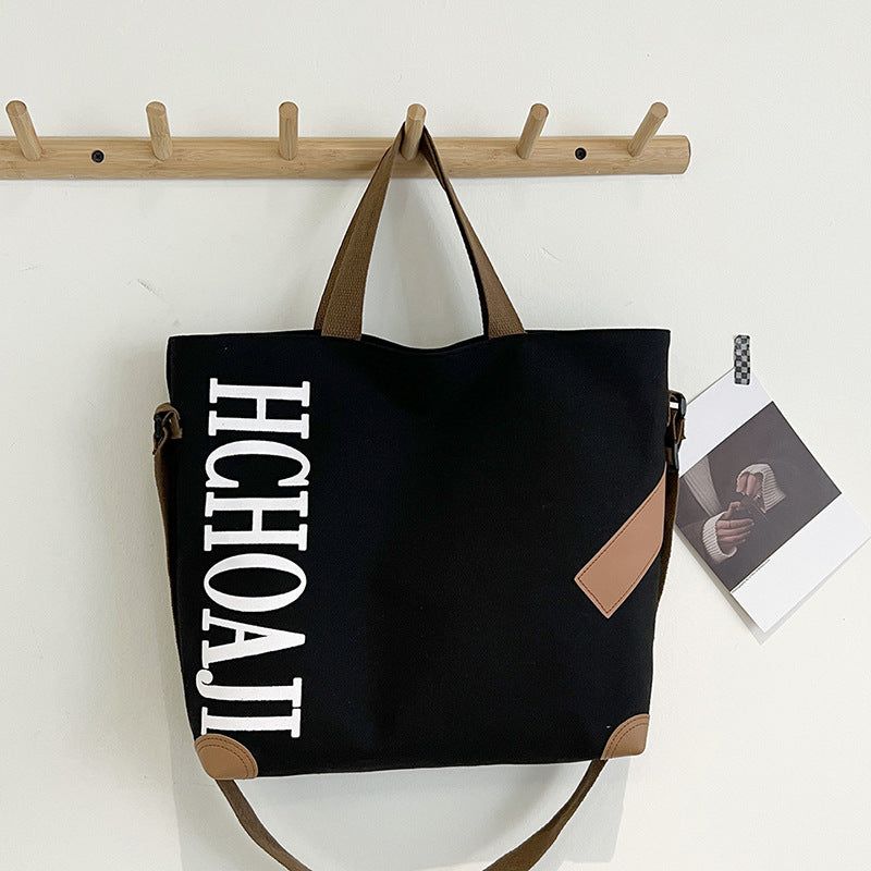Outdoor canvas bag, women's high-end sense, large capacity tote bag, student class niche ins crossbody shoulder bag